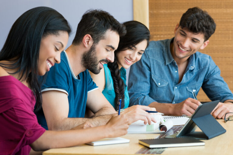 Closeup,Shot,Of,Young,Man,And,Woman,Discussing,On,Note